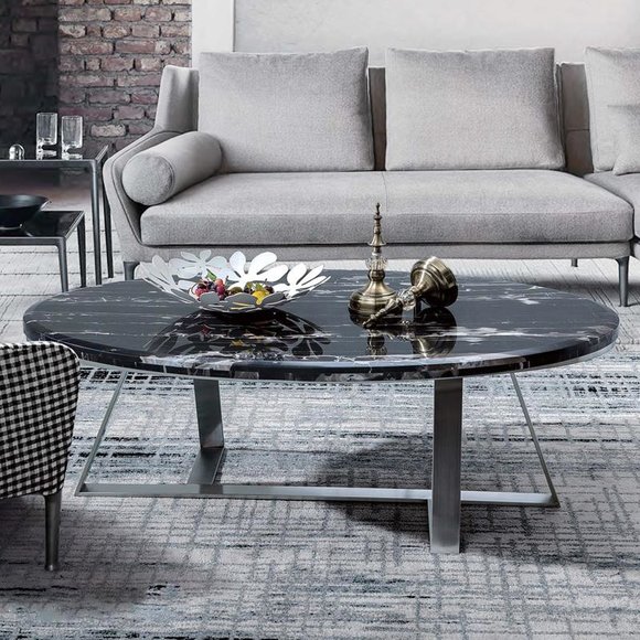 Der schönste Couch-Tisch aus Metall und Glas